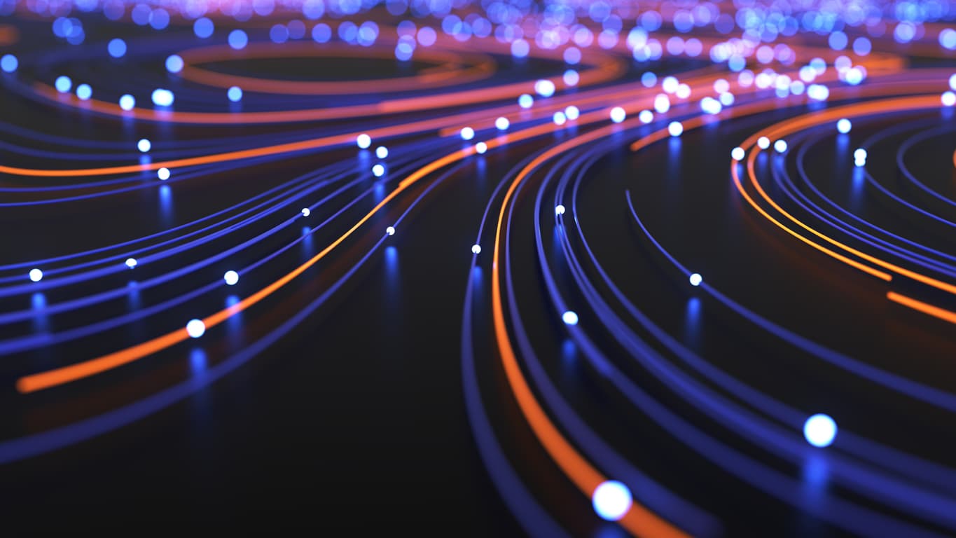 On a dark background, red lines flow toward the horizon, populated with white dots along the way. This photo illustrates routing customer calls to different agents based on why they are calling.