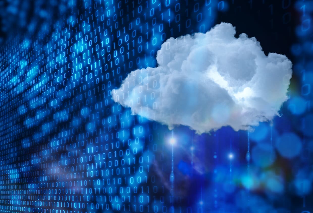 This image shows a cloud on a blue background with code to the left of it moving into it. Steaming from the cloud are points of light, symbolizing not only cloud data migration, but how data then streams from the cloud.