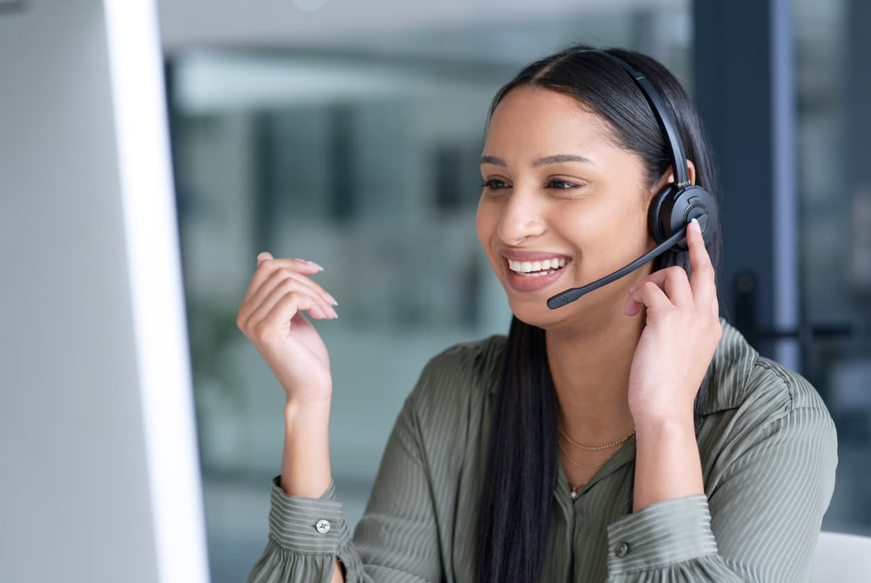 A contact center agent talking to a customer.