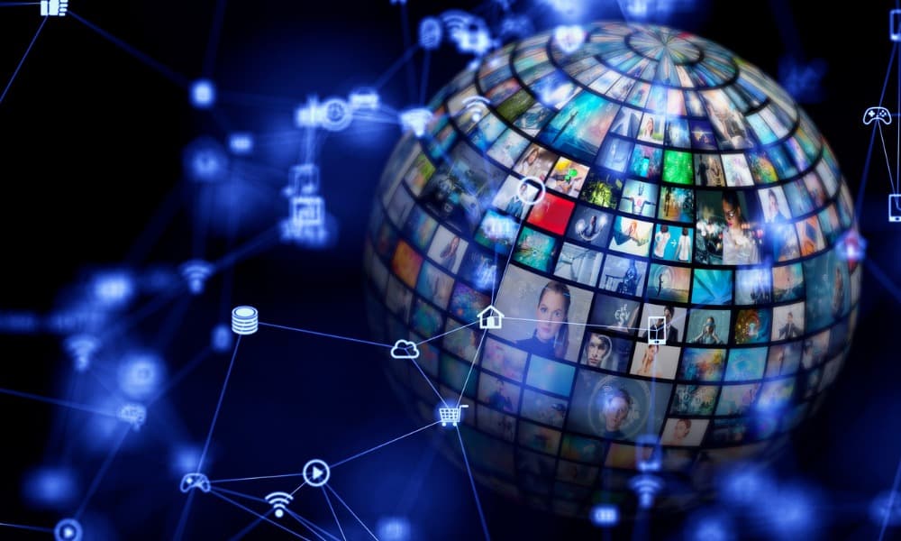Image of a world globe covered by individual squares representing customers with interconnecting lines representing external connection points